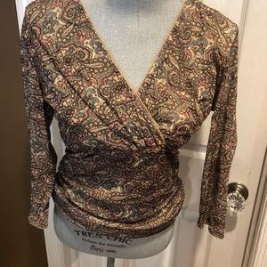 The limited top like new size Large